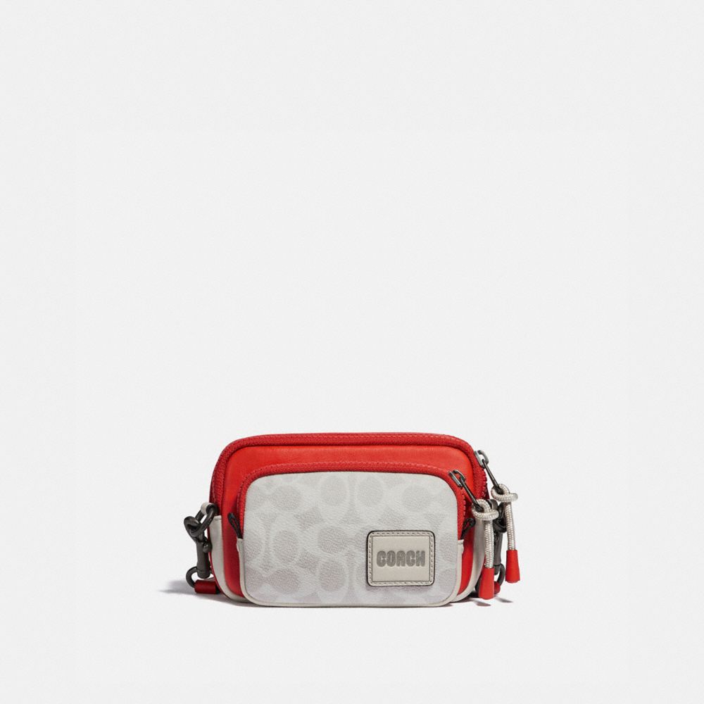 Mini edge double pouch crossbody discount in signature canvas with coach patch