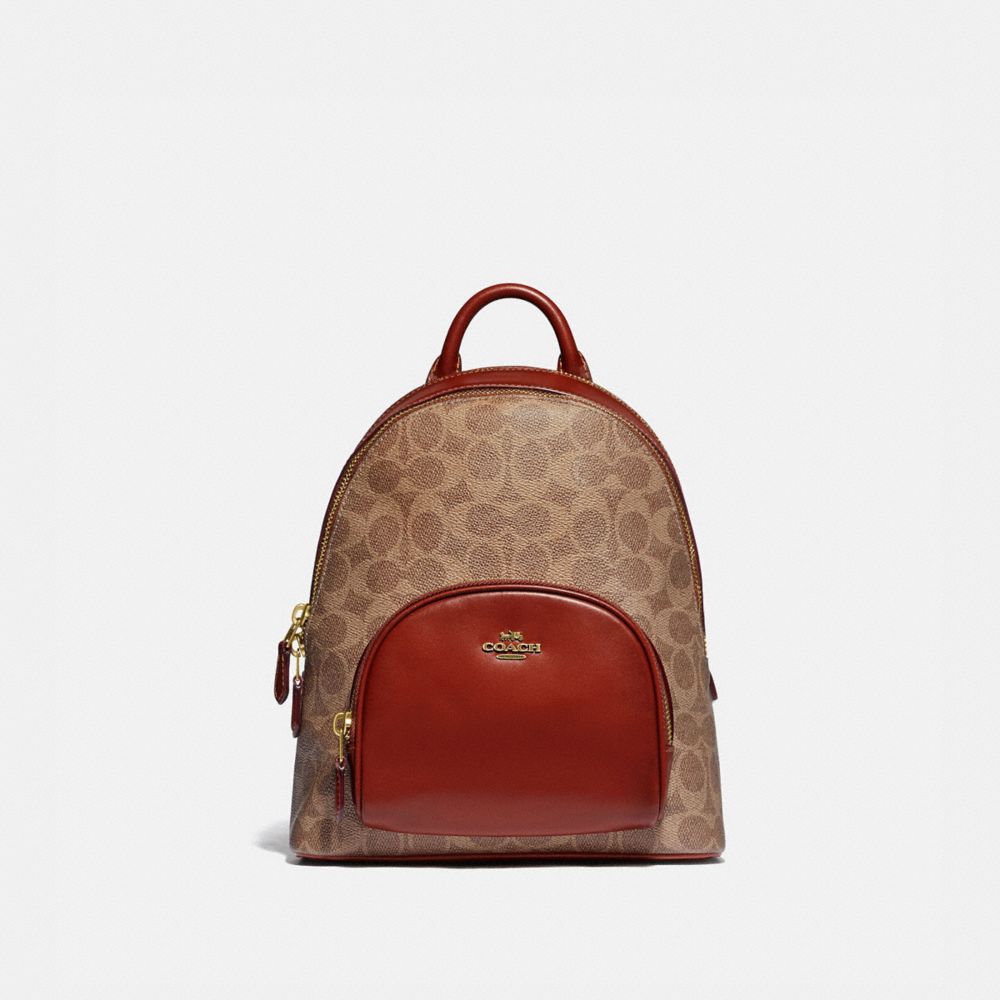 COACH®,CARRIE BACKPACK 23 IN SIGNATURE CANVAS,Signature Coated Canvas/Smooth Leather,Medium,Brass/Tan/Rust,Front View image number 0