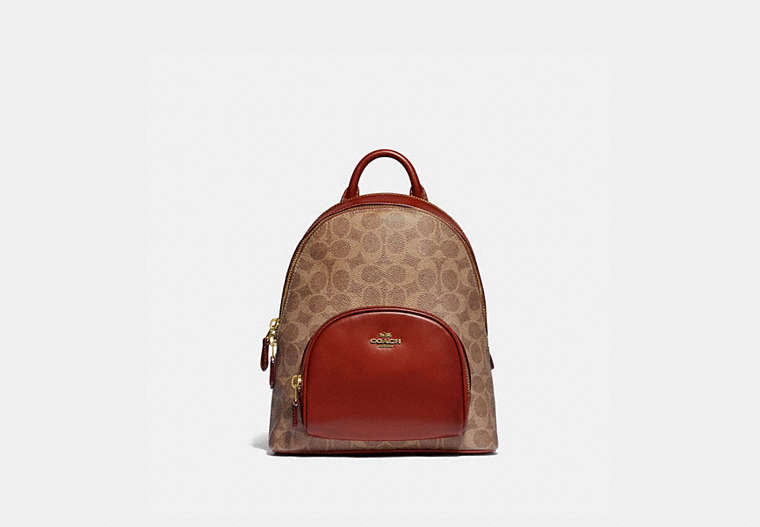 COACH®,CARRIE BACKPACK 23 IN SIGNATURE CANVAS,Signature Coated Canvas/Smooth Leather,Medium,Brass/Tan/Rust,Front View