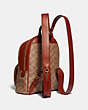 COACH®,CARRIE BACKPACK 23 IN SIGNATURE CANVAS,Signature Coated Canvas/Smooth Leather,Medium,Brass/Tan/Rust,Angle View