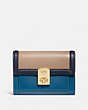 COACH®,HUTTON WALLET IN COLORBLOCK,Leather,Brass/Lake Multi,Front View