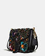 COACH®,COURIER BAG IN GLOVETANNED LEATHER WITH LEATHER SEQUINS,Leather,Medium,Brass/Black Multi,Angle View