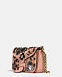 COACH®,COURIER CROSSBODY IN GLOVETANNED LEATHER WITH LEATHER SEQUINS,Leather,Small,OL/PINK MULTICOLOR,Angle View
