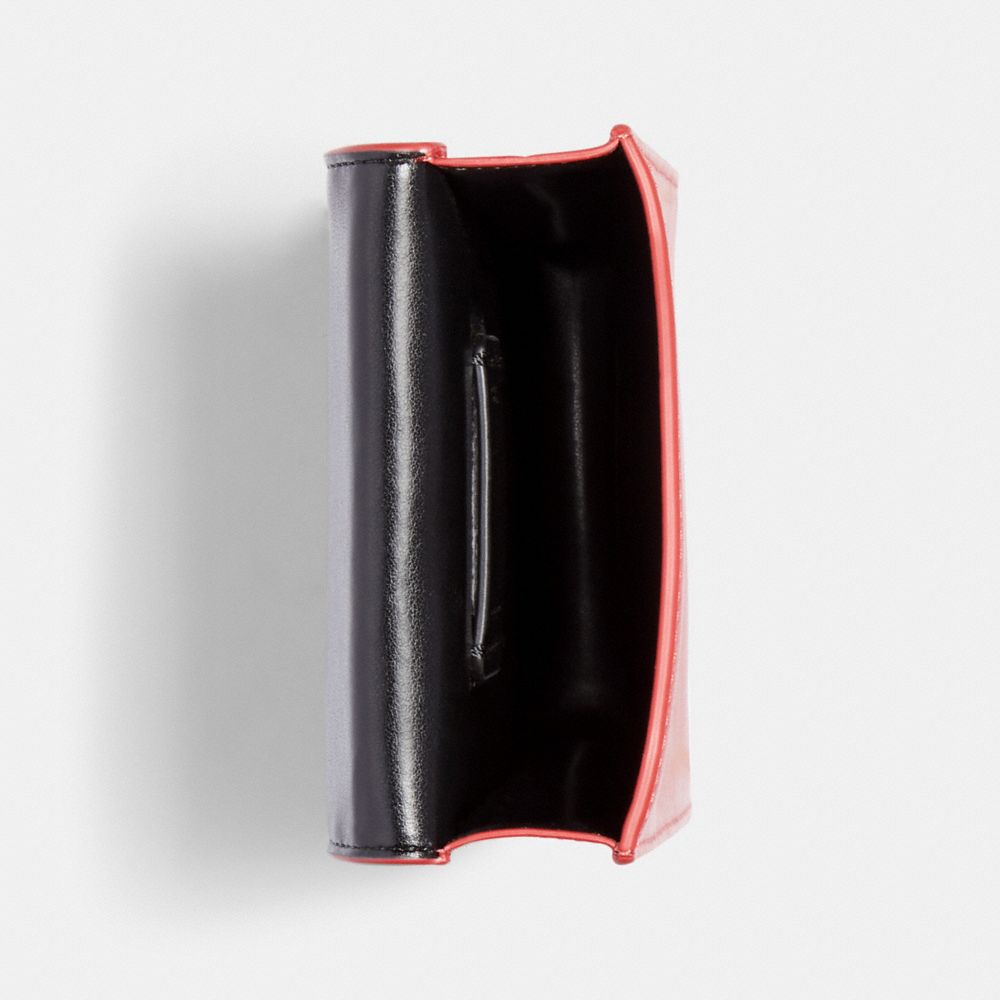 Porté-croisé pour téléphone Nord/Sud