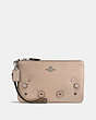 COACH®,SMALL WRISTLET WITH TEA ROSE AND TOOLING,Leather,Light Antique Nickel/Stone,Front View