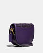 COACH®,TURNLOCK SADDLE CROSSBODY IN SNAKESKIN,Exotic/Smooth Leather,Brass/Royal Purple,Angle View