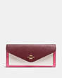 COACH®,SOFT WALLET IN COLORBLOCK,pusplitleather,Brass/Confetti Pink Multi,Front View