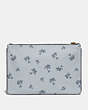 COACH®,TURNLOCK POUCH 26 WITH RAINBOW SIGNATURE SHARKY,Coated Canvas,Brass/Multi,Back View