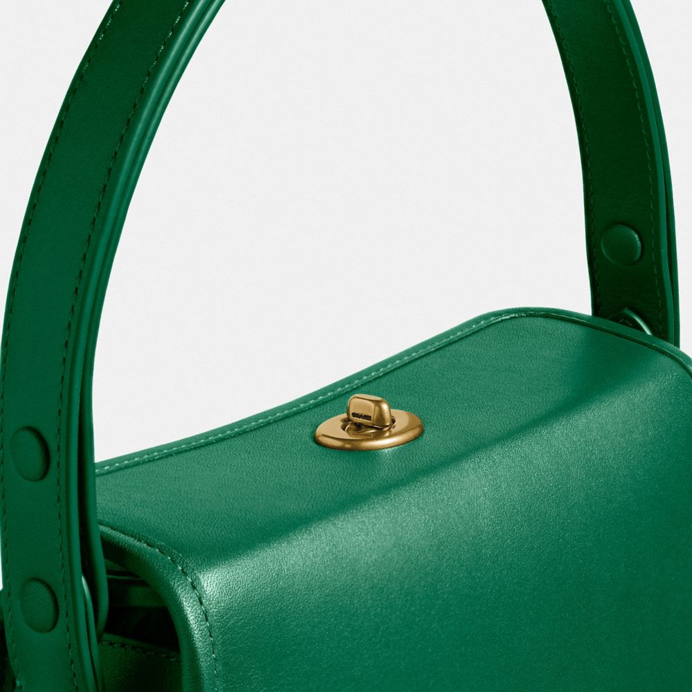 Coach turnlock best sale pouch green