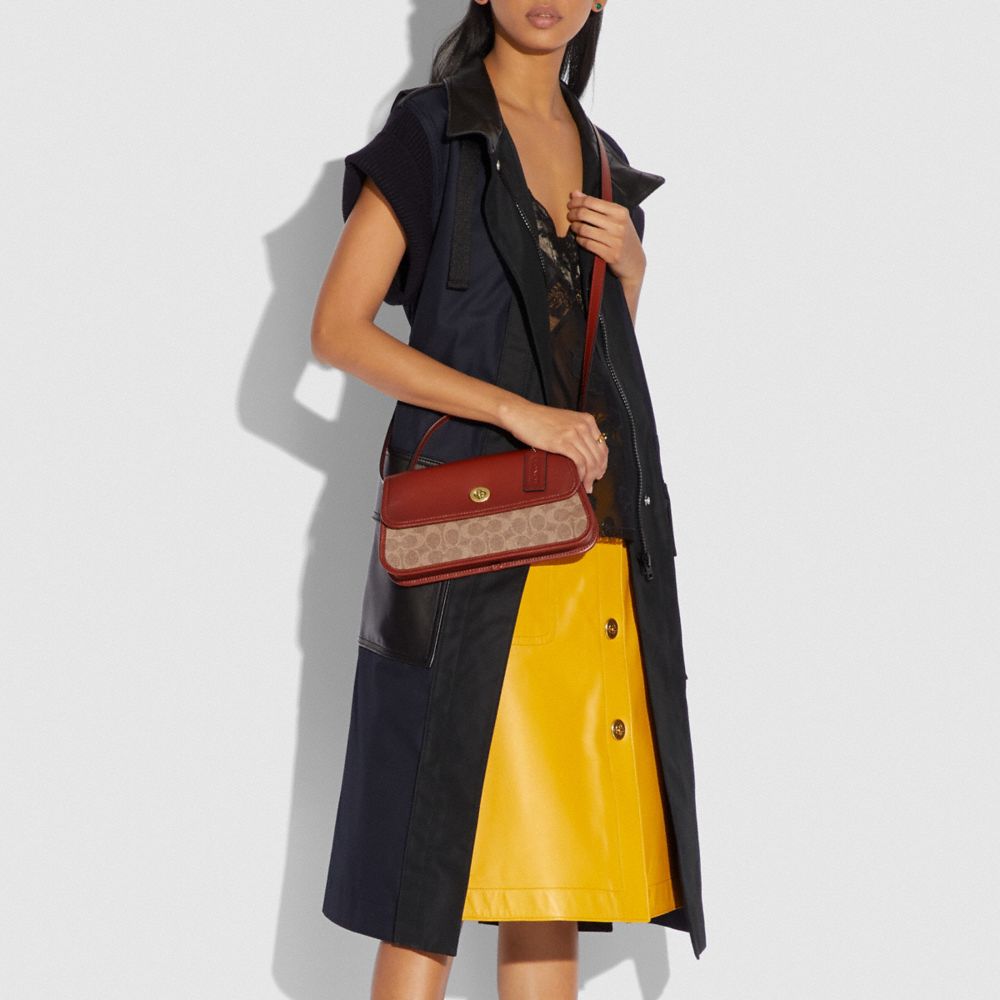 COACH®,Turnlock Clutch In Signature Canvas,,Detail View