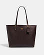 COACH®,REVERSIBLE CITY TOTE IN SIGNATURE CANVAS WITH BUTTERFLY PRINT,pvc,Large,Gold/Khaki Pink Multi/Oxblood,Angle View
