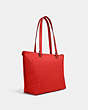 COACH®,GALLERY TOTE IN SIGNATURE LEATHER,Leather,Large,Gunmetal/Miami Red,Angle View