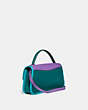 COACH®,TURNLOCK CLUTCH IN COLORBLOCK,Leather,Small,Brass/Bright Violet Multi,Angle View