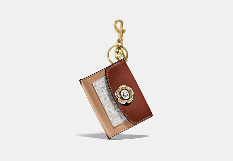 COACH®,MINI PARKER BAG CHARM IN COLORBLOCK SIGNATURE CANVAS WITH SNAKESKIN DETAIL,Leather,Brass/Saddle/Clay/Chalk/Tangerine,Front View