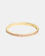 COACH®,SIGNATURE STONE HINGED BANGLE,Mixed Material,Gold/Dusty Rose,Front View