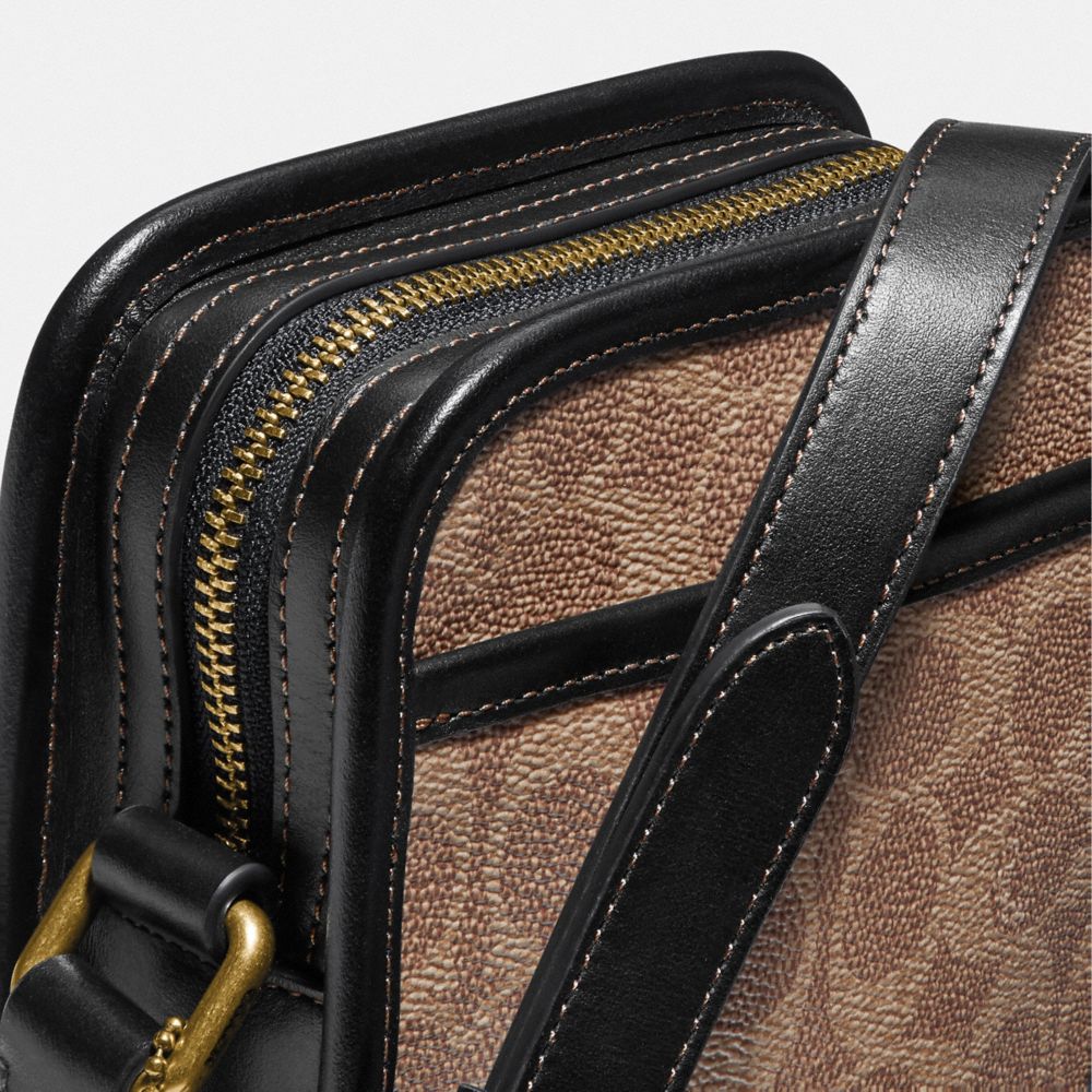 COACH® AD | Zip Camera Bag In Signature Canvas | Bags | Coach