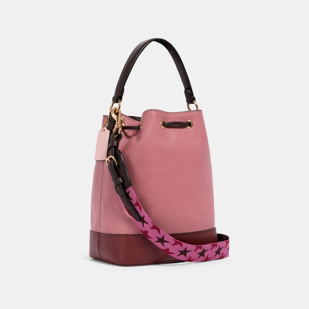 Jes drawstring bucket bag in colorblock with horse and carriage sale