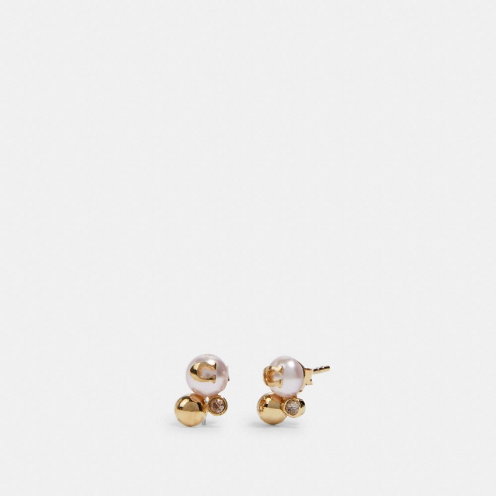 Boucles d’oreilles cloutées Grappes de perles signature