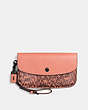 COACH®,CLUTCH WITH COLORBLOCK SNAKESKIN DETAIL,reptile,Black Copper/Melon,Front View