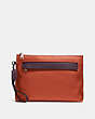 COACH®,POUCH IN COLORBLOCK,Leather,Deep Orange/Oxblood,Front View