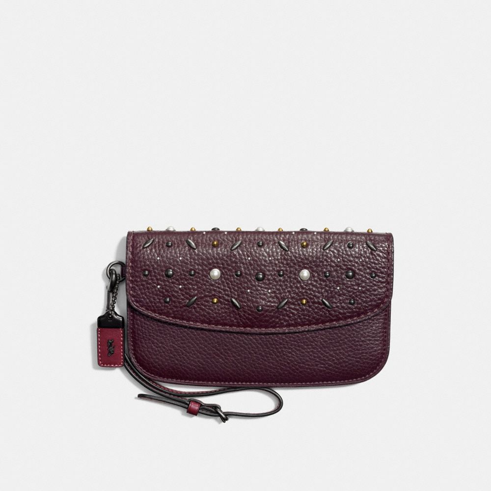 Clutch With Prairie Rivets