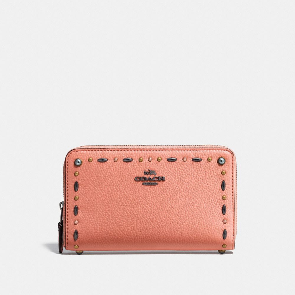 COACH®: Medium Zip Around Wallet With Prairie Rivets Detail