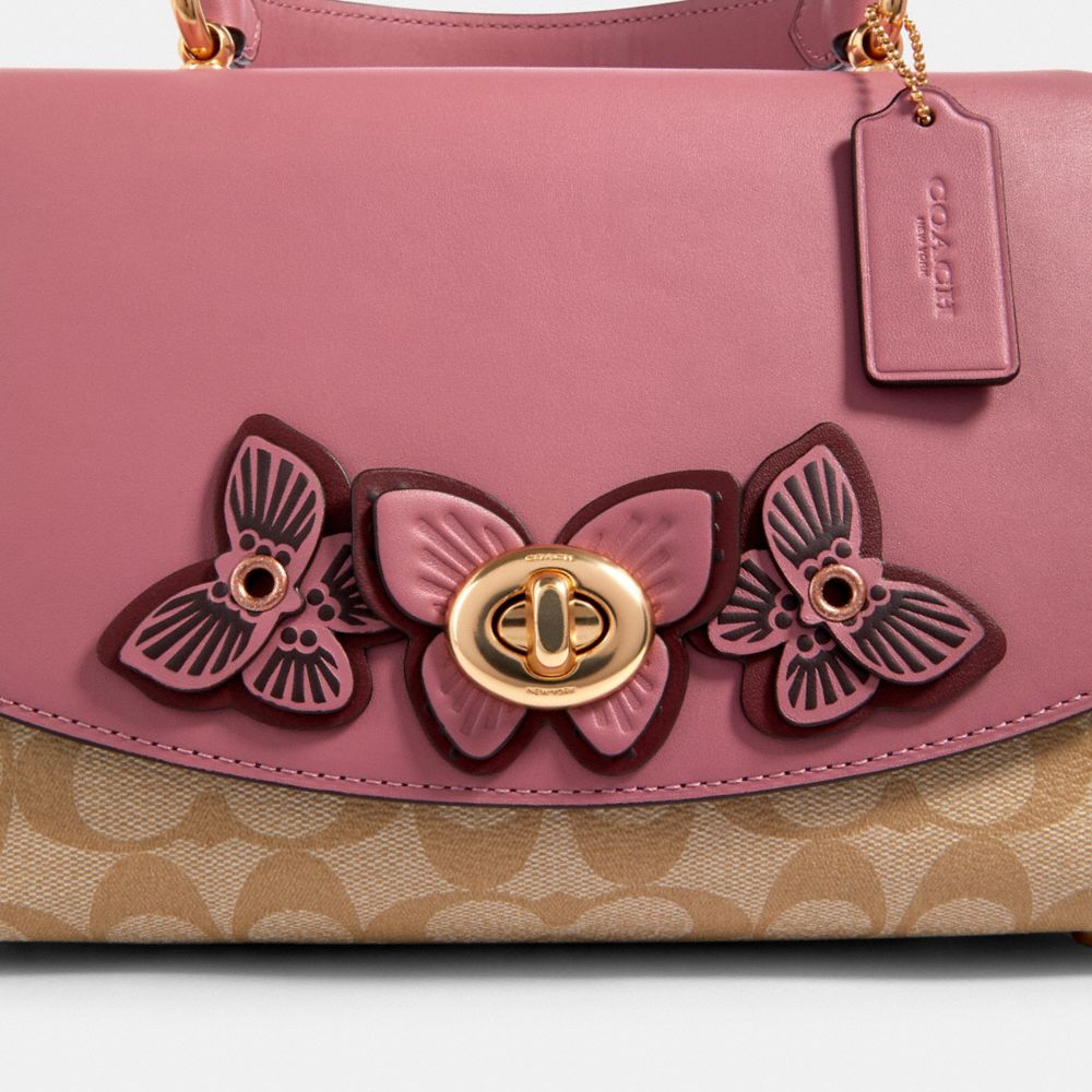 Coach handbag with discount butterflies