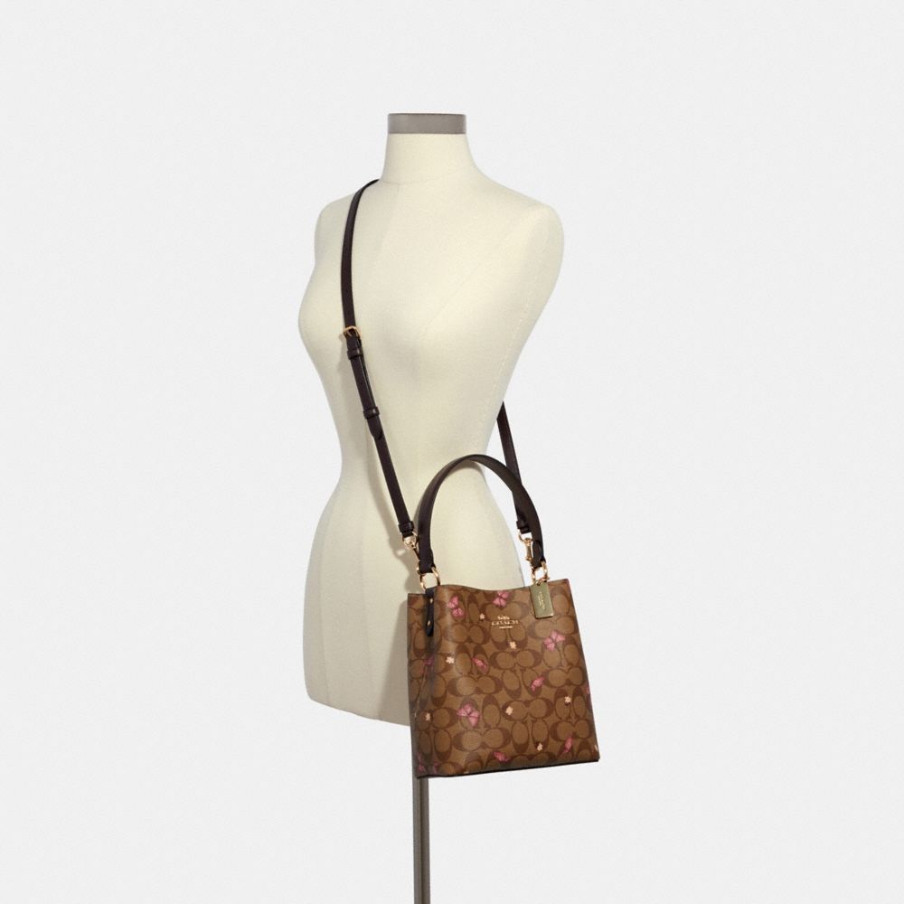 Small Town Bucket Bag In Signature Canvas With Butterfly Print