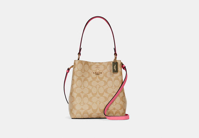 COACH®,SMALL TOWN BUCKET BAG IN SIGNATURE CANVAS,Leather,Medium,Gold/Light Khaki/Confetti Pink,Front View