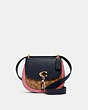 COACH®,REMI SADDLE BAG IN COLORBLOCK SIGNATURE CANVAS,Leather,Gold/Khaki/ Midnight Multi,Front View