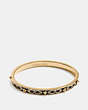 COACH®,SIGNATURE STUDDED BANGLE,Metal,Gold/Black,Front View