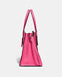 COACH®,CHARLIE CARRYALL,Pebbled Leather,Large,Brass/Confetti Pink,Angle View