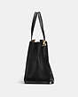 COACH®,CHARLIE CARRYALL,Pebbled Leather,Large,Light Gold/Black,Angle View