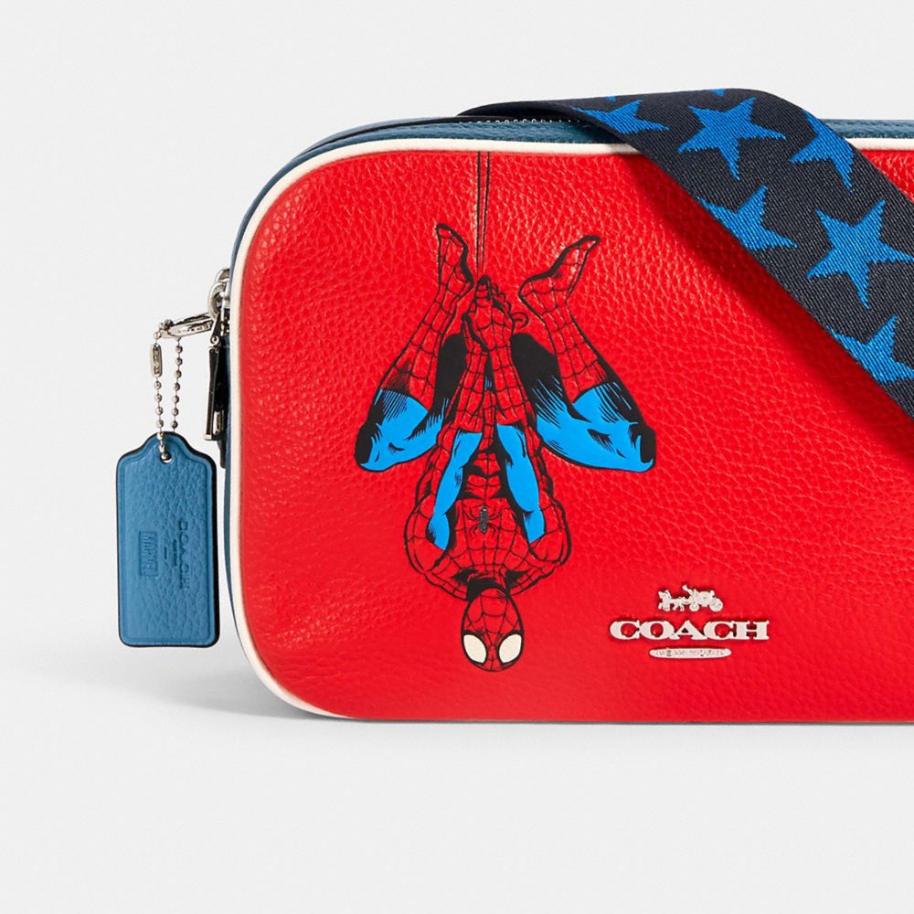 Coach spiderman wristlet sale