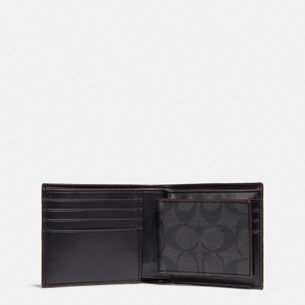 COACH®  Bifold Wallet In Signature Canvas