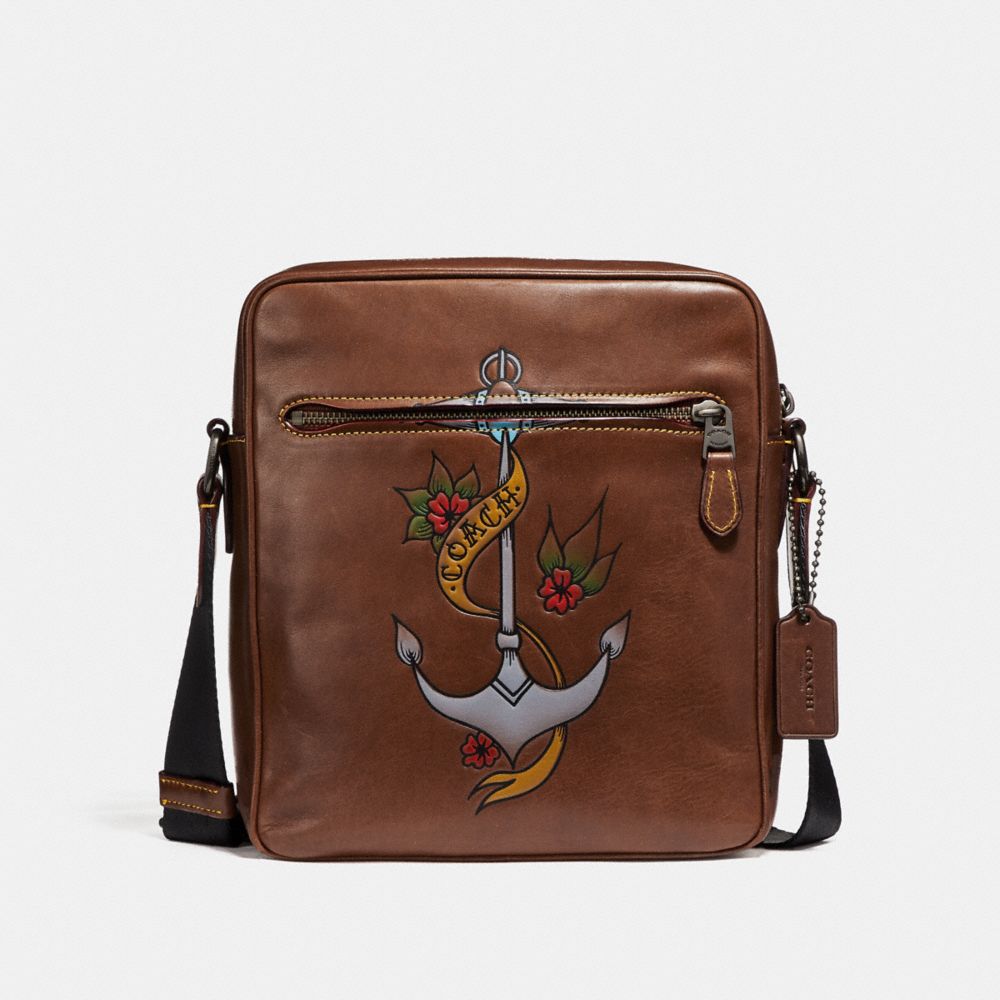 Coach sling bag store with tattoo