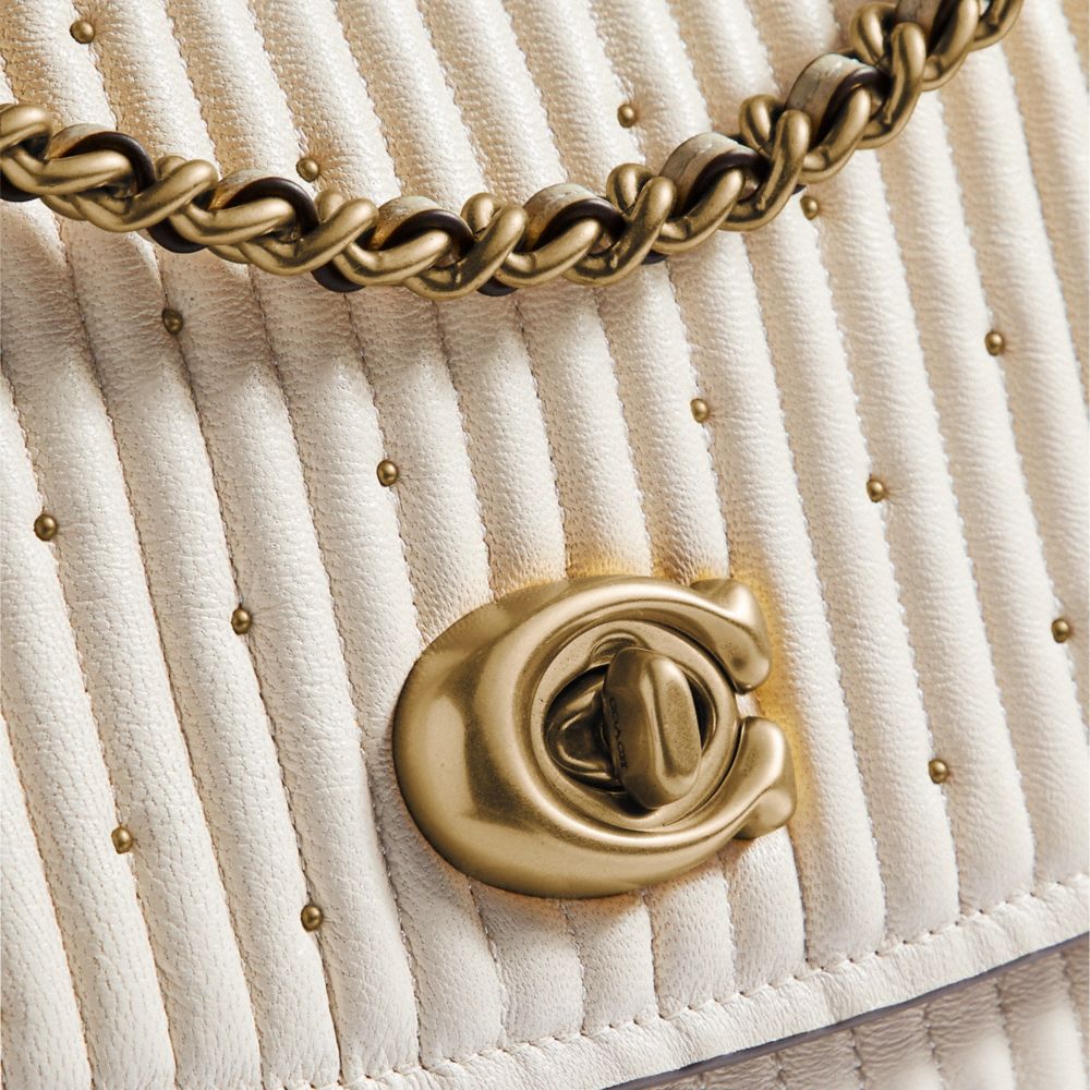 COACH®,PARKER AVEC MATELASSAGE ET RIVETS,Cuir souple,Laiton/Craie,Closer View