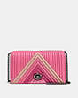 COACH®,FOLDOVER CHAIN CLUTCH WITH COLORBLOCK QUILTING AND RIVETS,Leather,Mini,Gunmetal/Bright Pink Multi,Front View