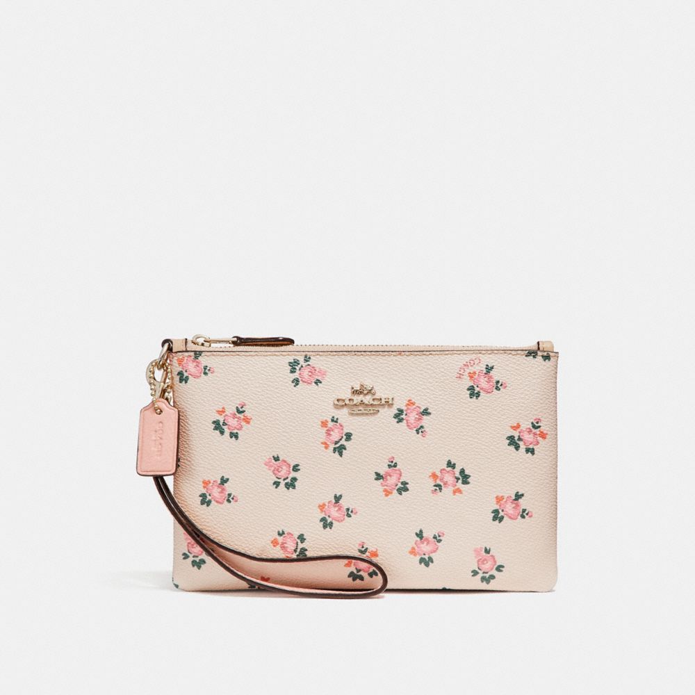 Coach flower wristlet sale