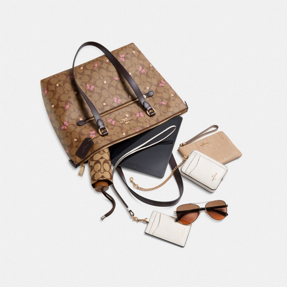 COACH®,Gallery Tote Bag In Signature Canvas With Butterfly Print,,Angle View