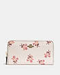 COACH®,ACCORDION ZIP WALLET WITH FLORAL BOW PRINT,Leather,Brass/Chalk,Front View