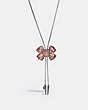 COACH®,LARGE CRYSTAL BOW BOLO NECKLACE,Metal,Silver/PEACH,Front View