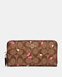 COACH®,ACCORDION ZIP WALLET IN SIGNATURE CANVAS WITH BUTTERFLY PRINT,pvc,Mini,Gold/Khaki Pink Multi,Front View