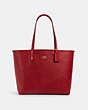 COACH®,REVERSIBLE CITY TOTE WITH AMERICANA STAR PRINT,pvc,Gold/Navy Red Multi/True Red,Angle View