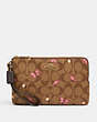 COACH®,DOUBLE ZIP WALLET IN SIGNATURE CANVAS WITH BUTTERFLY PRINT,pvc,Gold/Khaki Pink Multi,Front View