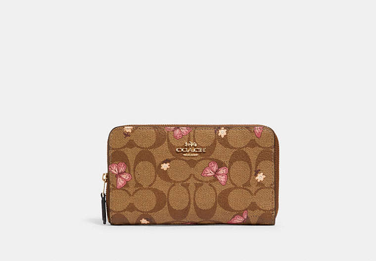 COACH®,MEDIUM ID ZIP WALLET IN SIGNATURE CANVAS WITH BUTTERFLY PRINT,Gold/Khaki Pink Multi,Front View