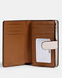 Medium Corner Zip Wallet In Signature Leather