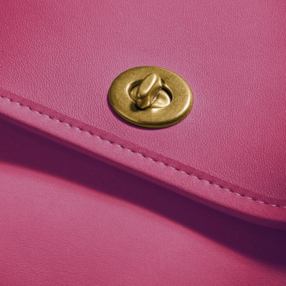 COACH®,Turnlock Pouch,,Closer View