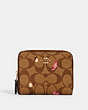 COACH®,SMALL ZIP AROUND WALLET IN SIGNATURE CANVAS WITH BUTTERFLY PRINT,Gold/Khaki Pink Multi,Front View