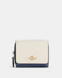 COACH®,SMALL TRIFOLD WALLET IN COLORBLOCK,Leather,Mini,Gold/Chalk Multi,Front View